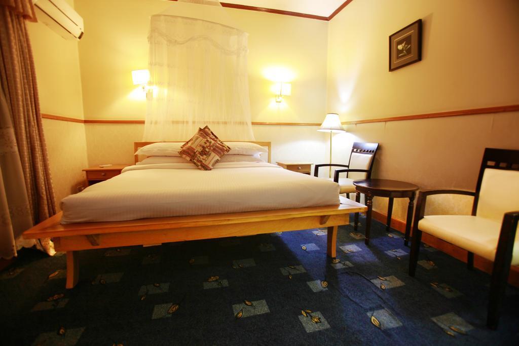 Shangri-La Hotel Uganda Кампала Номер фото