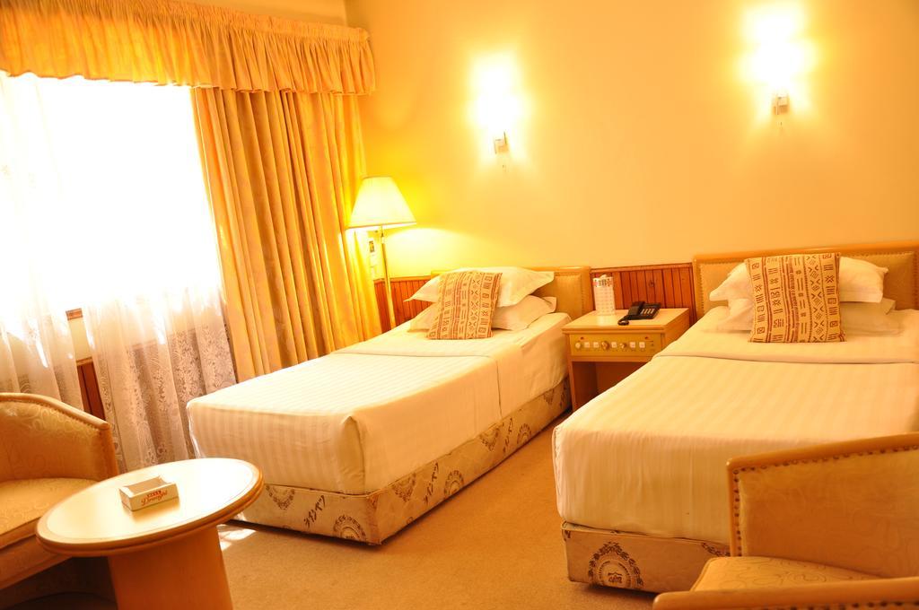 Shangri-La Hotel Uganda Кампала Номер фото